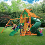 Gorilla Playsets Mountaineer Treehouse Wooden Swing Set with Tube Slide, Rope Ladder, and Sandbox - Image 2